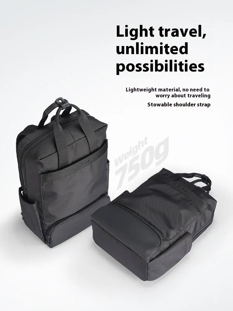 Black Oxford cloth computer backpack showing organisational storage compartments and laptop section