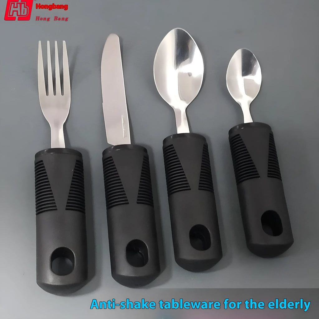 Stainless steel adaptive spoons with black rubber anti-shake handles, part of a rehabilitation cutlery set.