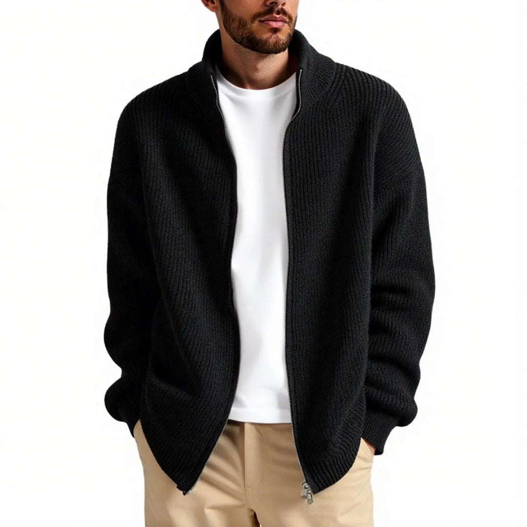 Man wearing a loose-fit grey cardigan sweater, a casual base layer for leisure wear.