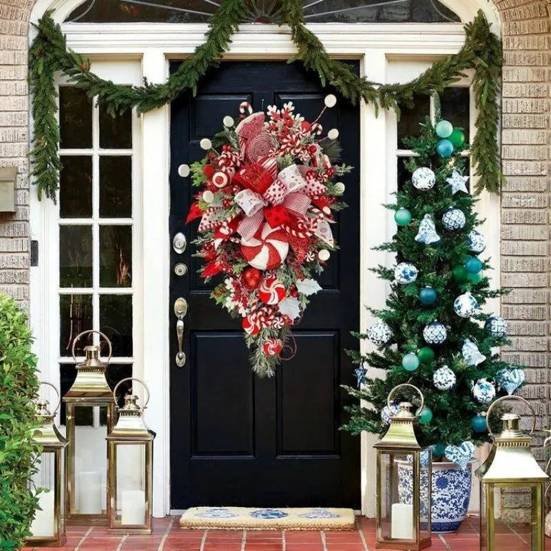 Artificial Christmas wreath with candy and upside-down tree design, 50cm or 60cm, yellow ribbon loops for hanging.