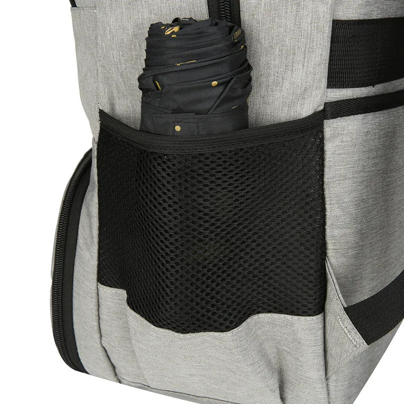 Insulated oxford cloth backpack in light grey showing curved shoulder straps and dry-wet separation compartment.