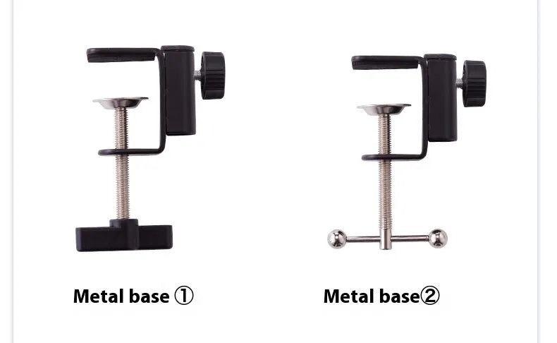 Black foldable metal desktop cantilever bracket holding a tablet, showing adjustable arm and clip.