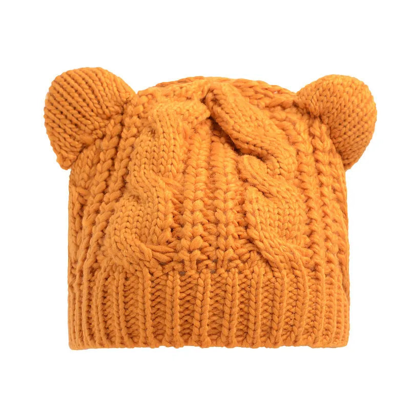 Hand made 3D knitted cat ear winter beanie in wool, shown in multiple colour options