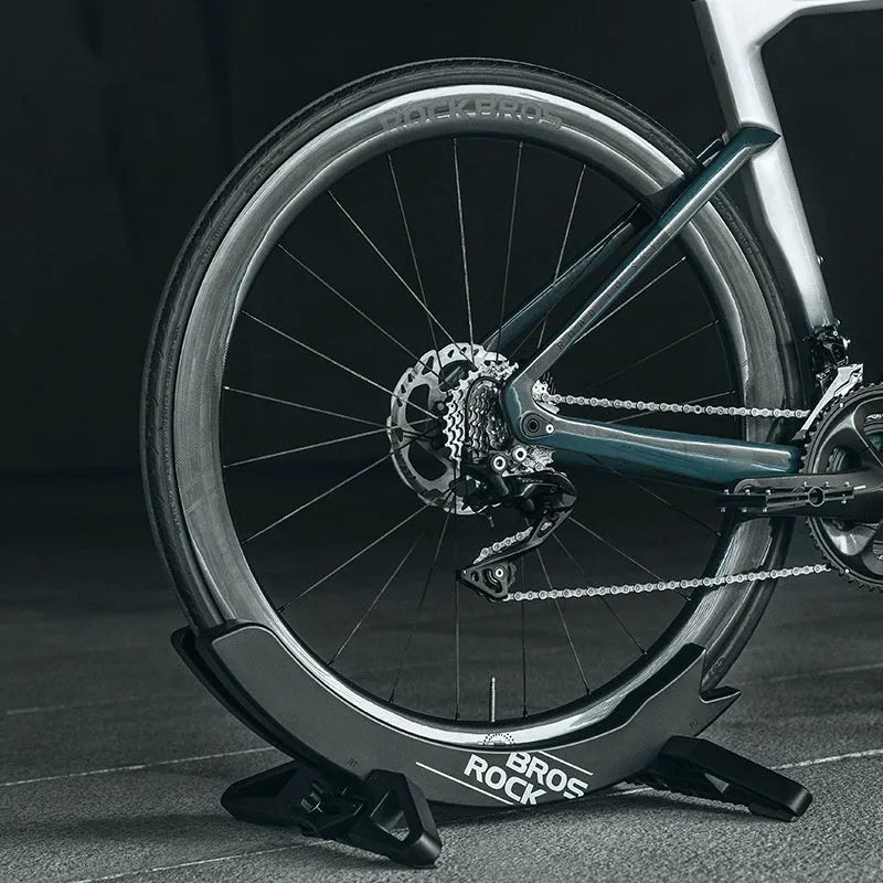 Black and green bicycle wall mount parking rack for mountain and road bikes