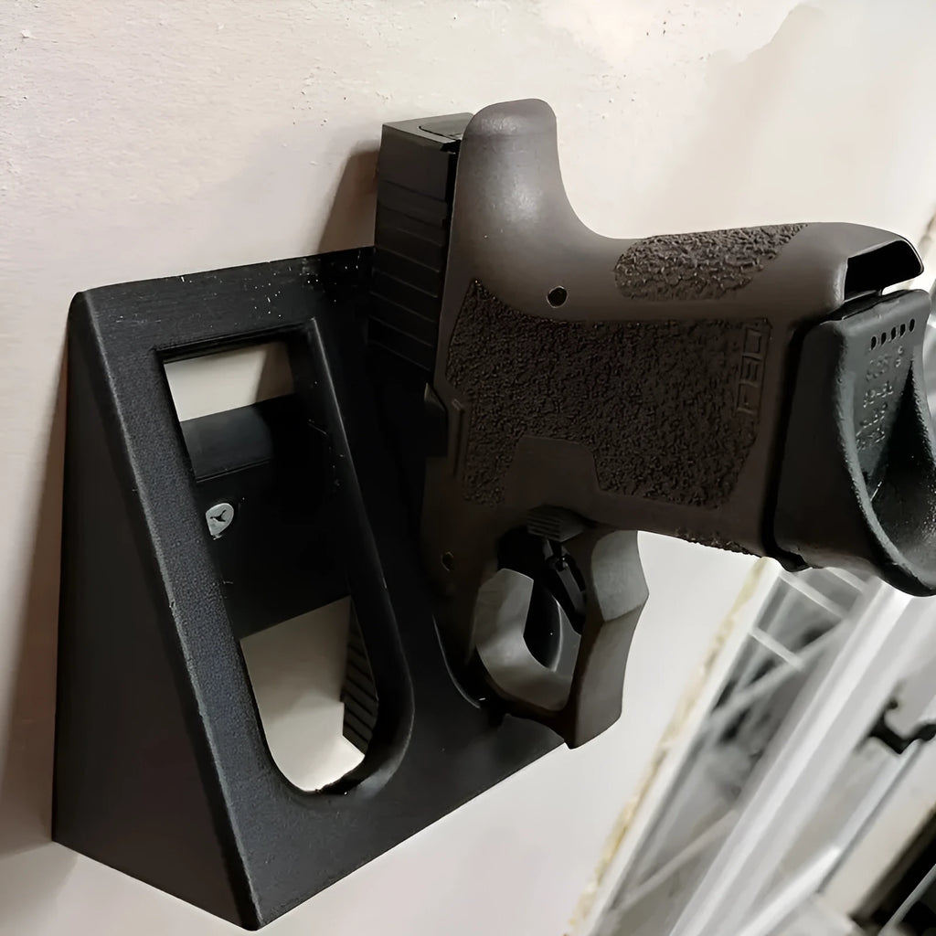Black punk-style plastic pistol display stand for model guns