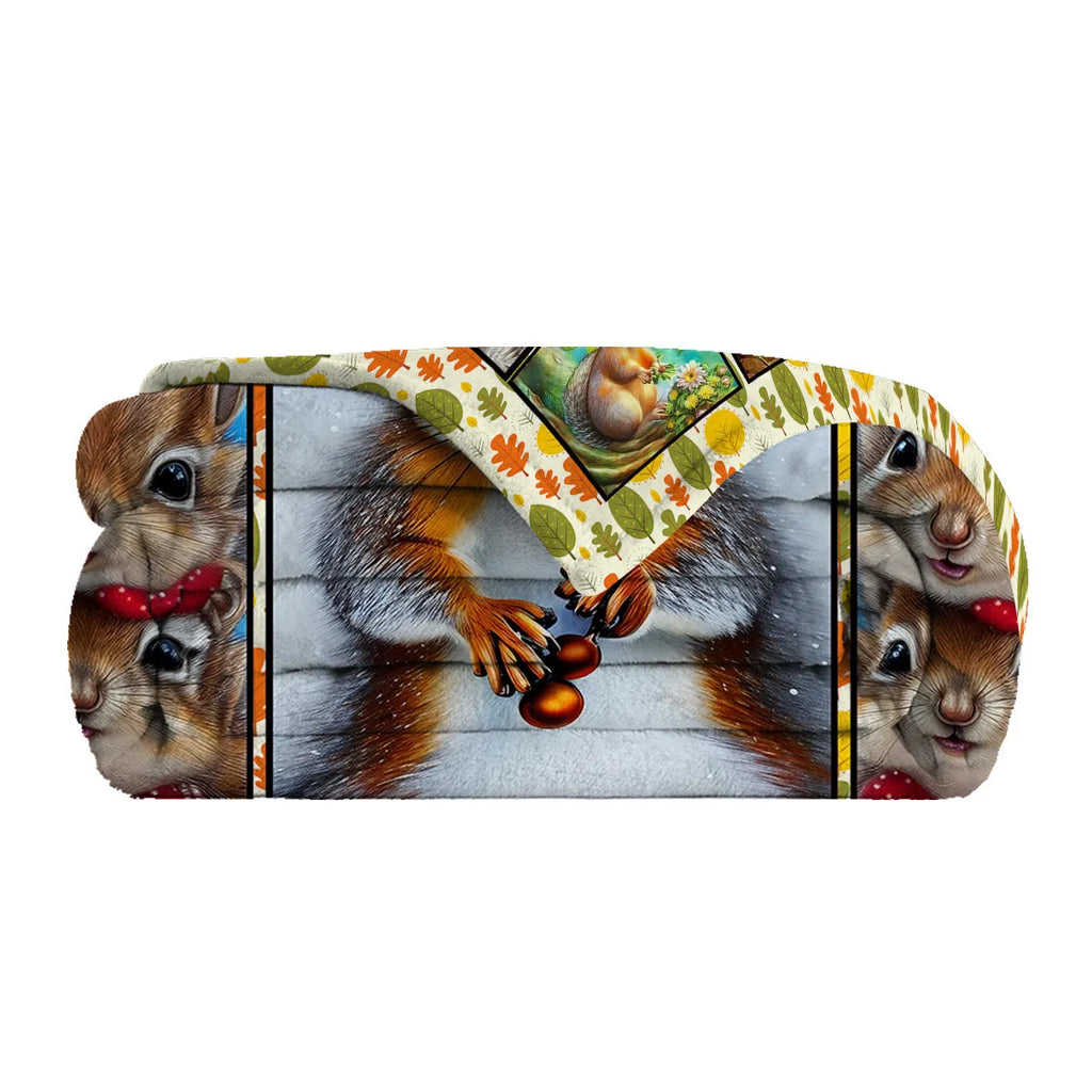 Yellow flannel blanket with white-bellied squirrel print, 130x150cm, folded on sofa