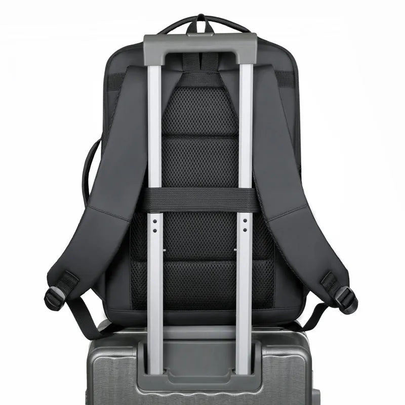 Black Oxford cloth backpack with curved shoulder straps showing business travel styling