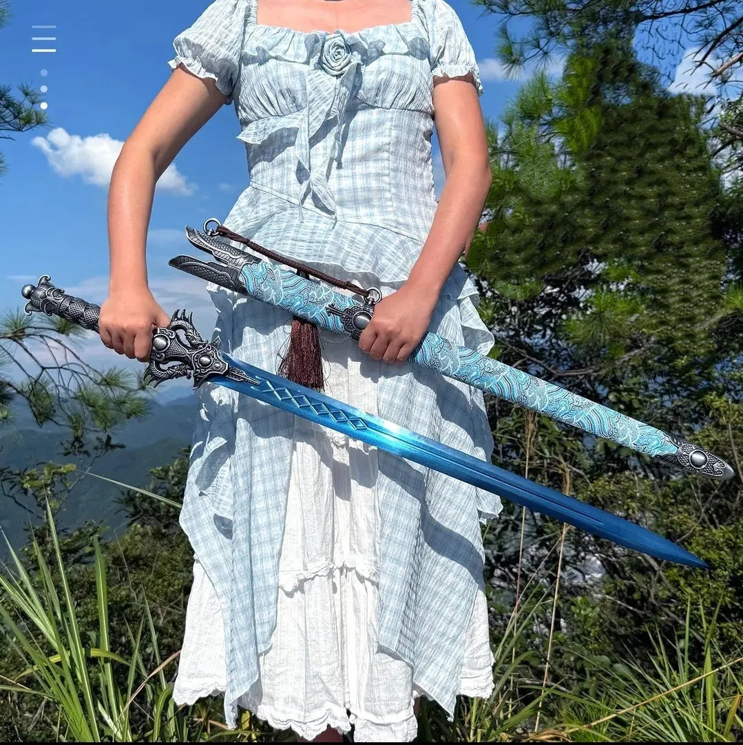 Blue Xingyuan sword from Longquan City with high manganese steel blade and leather-covered scabbard on display