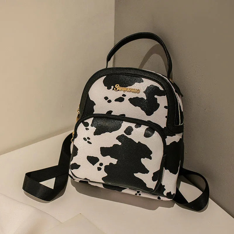 Girls' small PU backpack in Korean style with front pocket, in Snake White colour