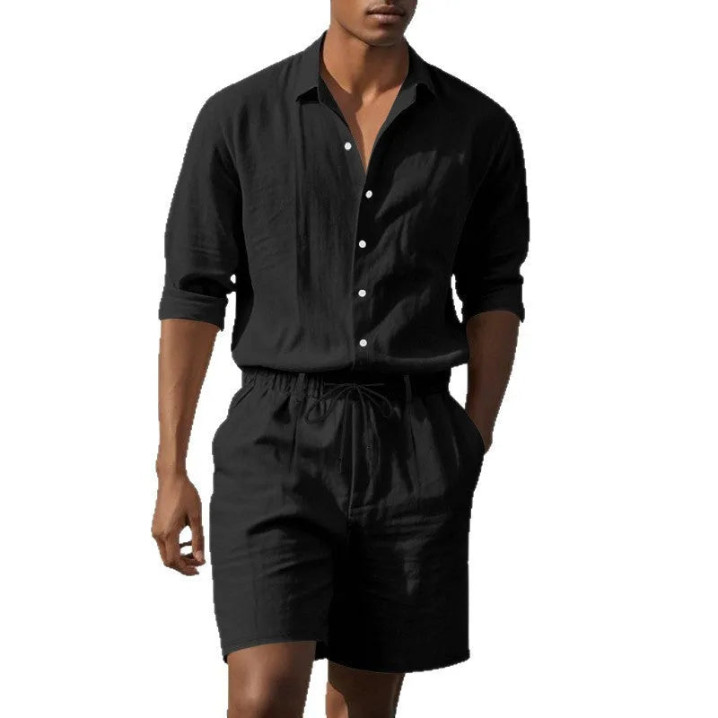 Men's white linen long-sleeve shirt and matching shorts beach suit set laid flat.