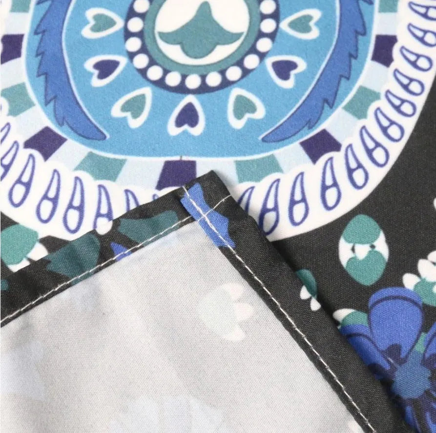 Printed mandala tapestry wall hanging in polyester with green, orange, purple colour options and multiple sizes up to 200x150cm