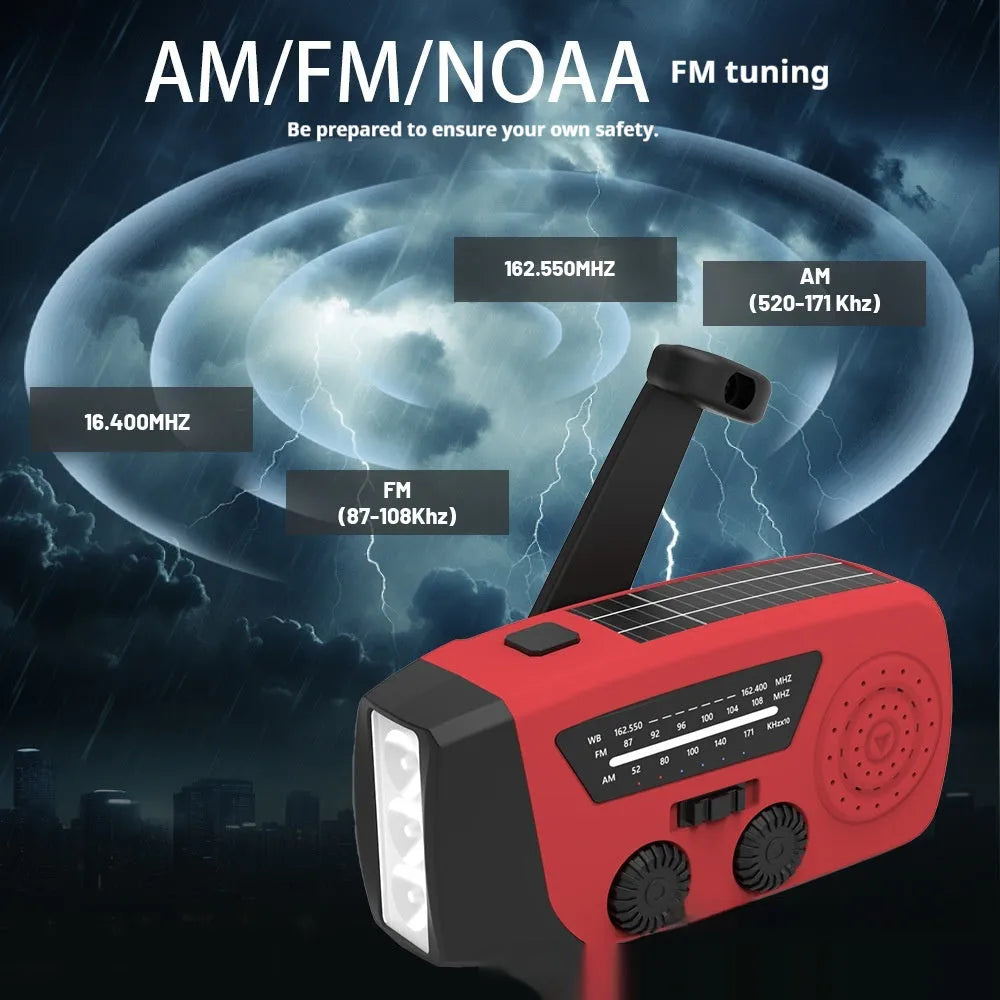 Red rechargeable emergency hand radio with built-in torch and wrist strap for disaster preparedness kits