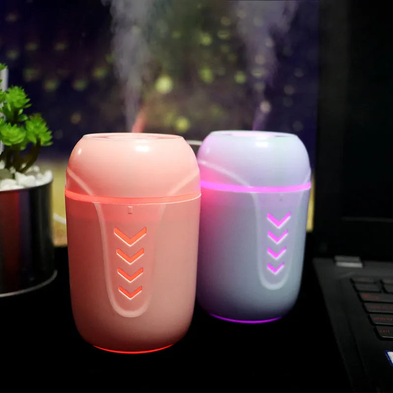 Blue columnar portable car humidifier with USB cable and 200ml water tank.
