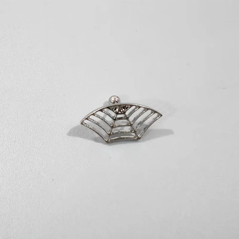 Metal spider web stud earrings in electroplated gold or silver finish, geometric mesh design.