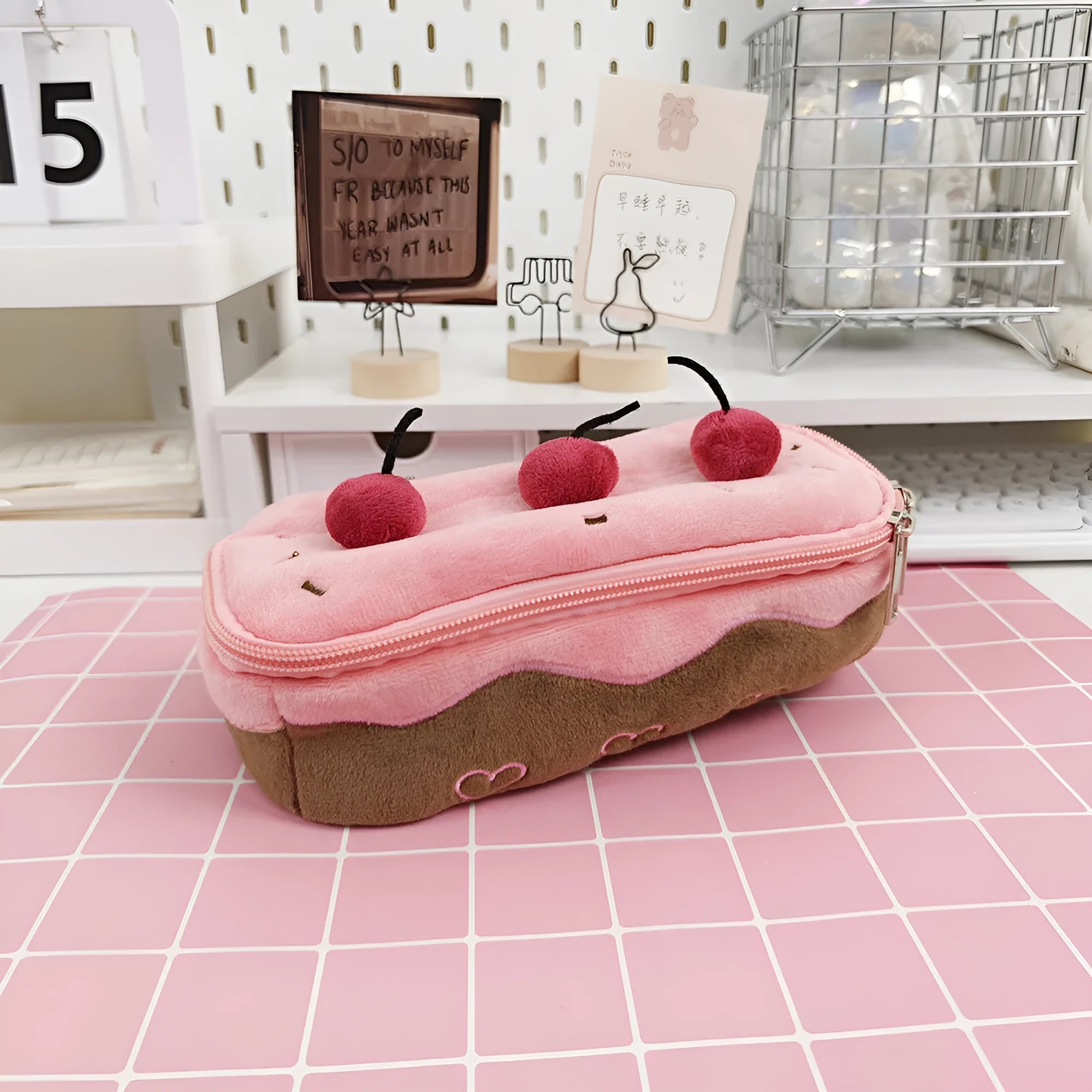Cherry cake pattern plush velvet pencil case with a zip closure.