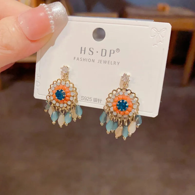 Purple and blue diamond embedded round crystal tassel earrings with thick gold plated copper geometry design