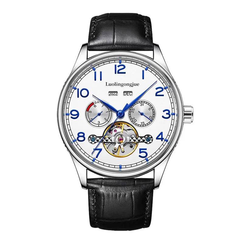 Men's stainless steel mechanical watch with a leather strap and sapphire crystal glass on a wrist.