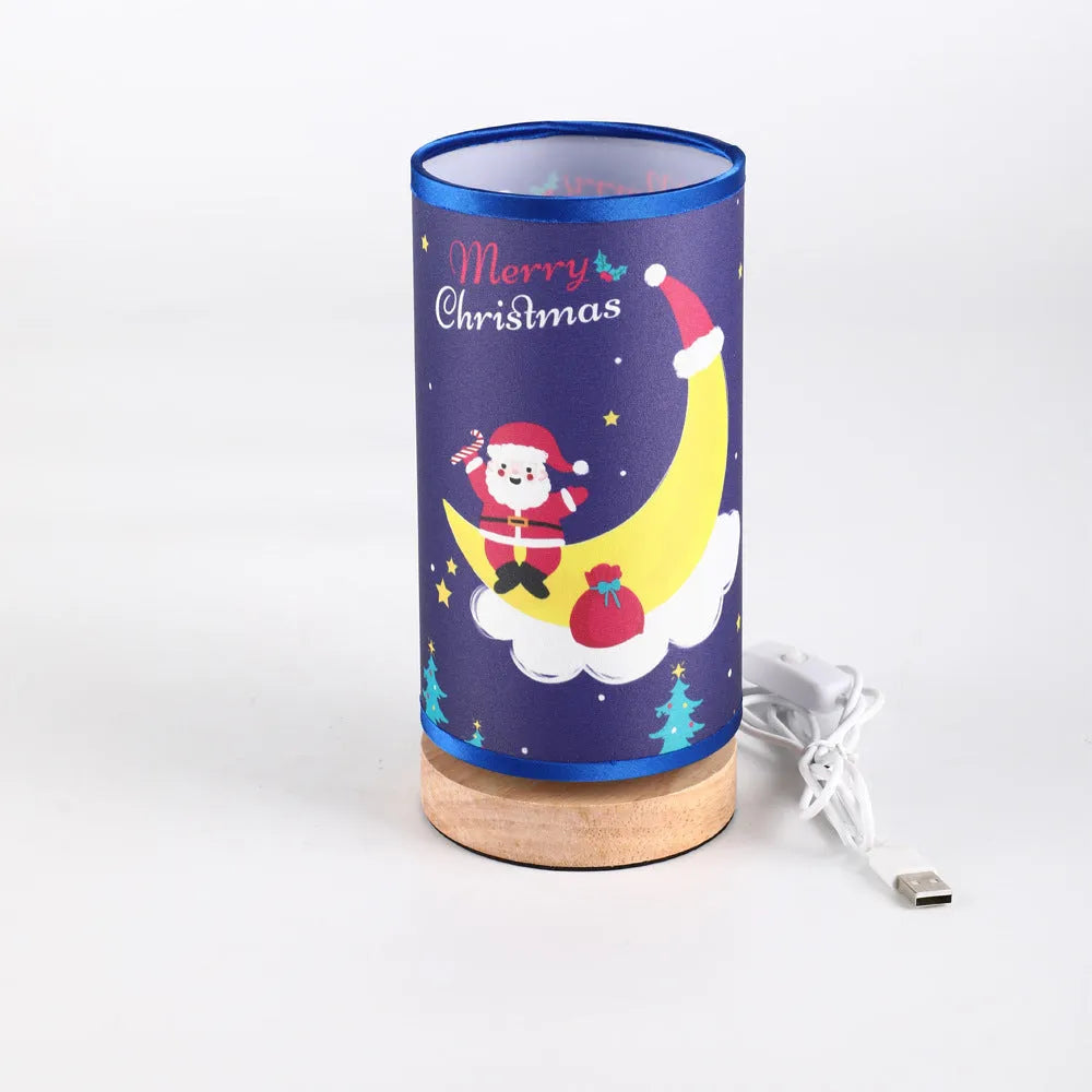 Moon Santa Claus themed LED night light with a bamboo base and a USB plug.