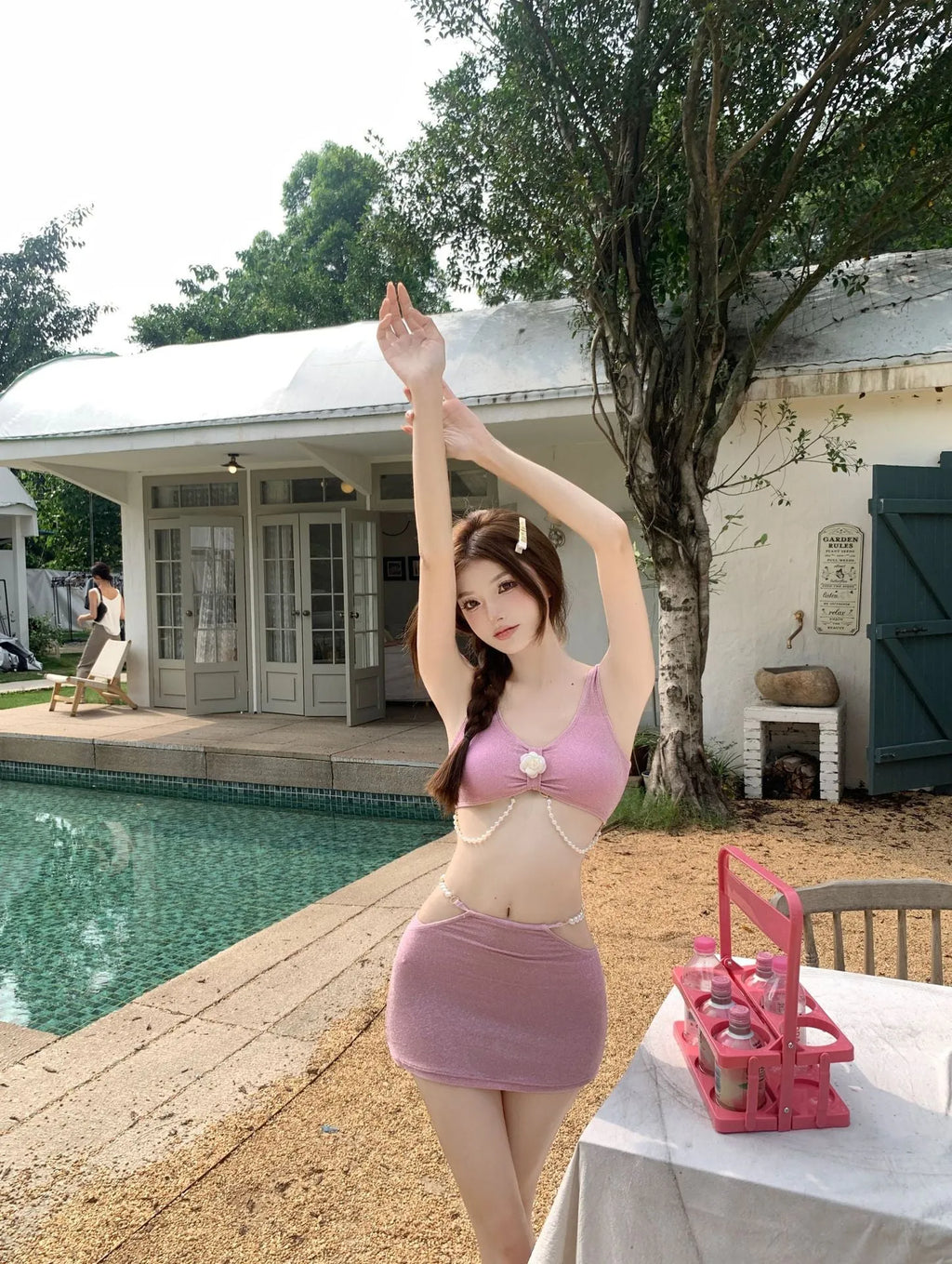 Women's three-piece polyester bikini set in pink or black with sleeveless briefs style for swimming and hot springs