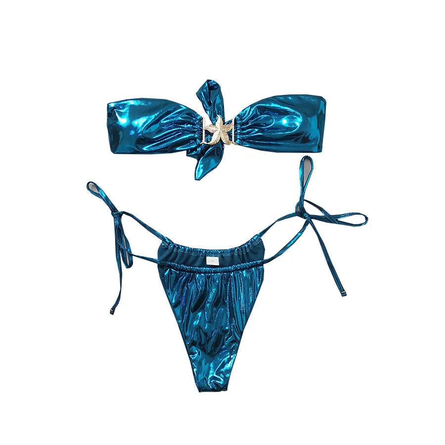 Women's glossy sapphire blue bikini set with gold starfish decoration, showing tube top and briefs.