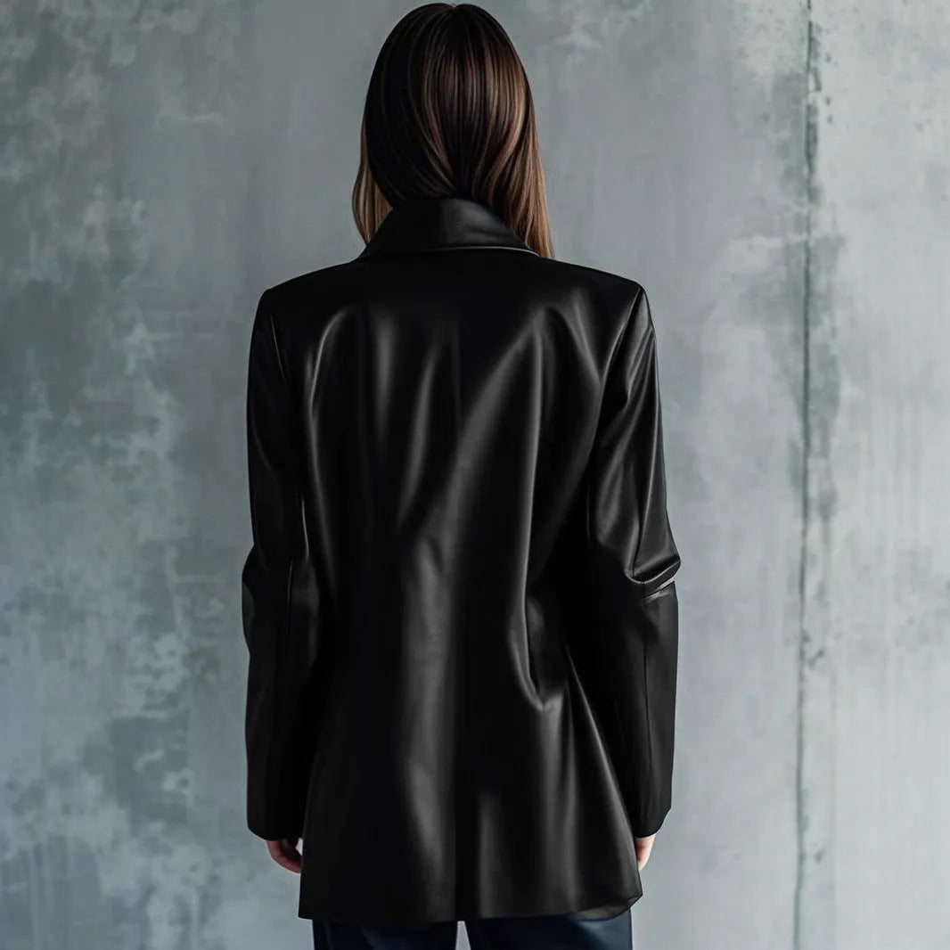 Women's black polyester leather jacket medium length 65cm shown on hanger