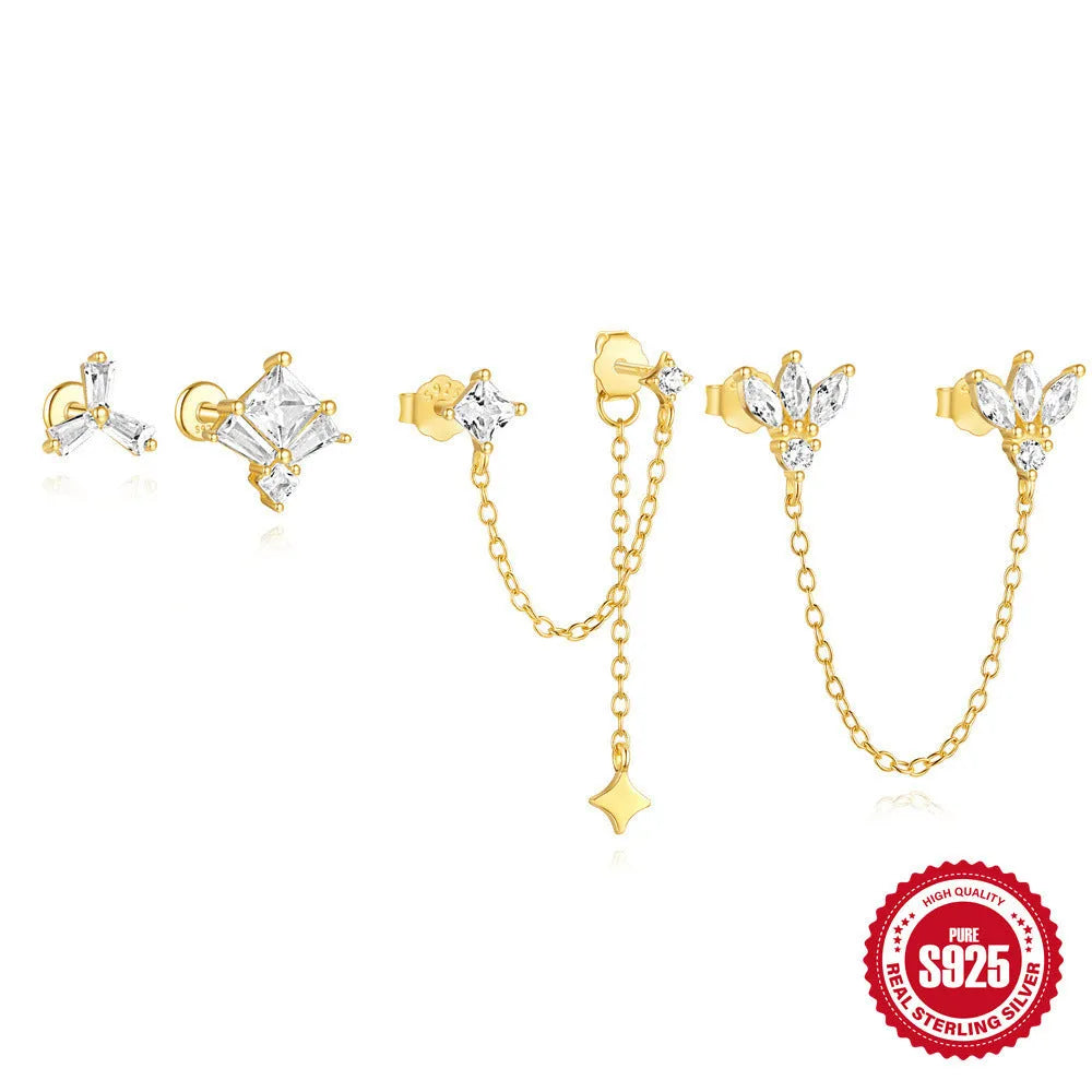 Sterling silver chain stud earrings with zircon inlay in geometric shapes including clover and crown designs
