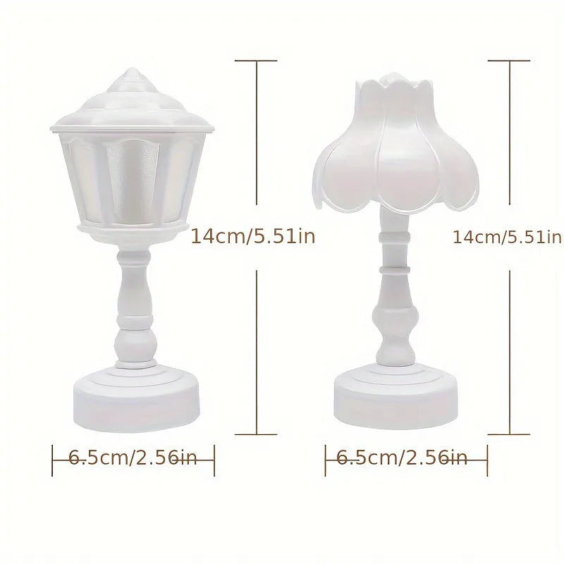 Small geometric retro pagoda night lamp in light purple, shown on a wooden surface.