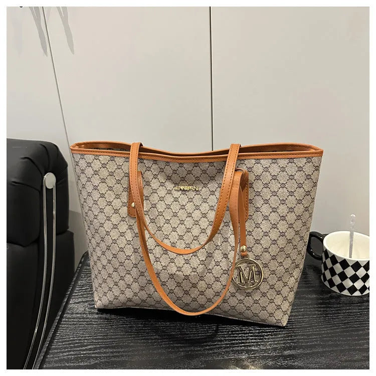 PU leather shoulder bag with adjustable strap in street trend style showing black colour option