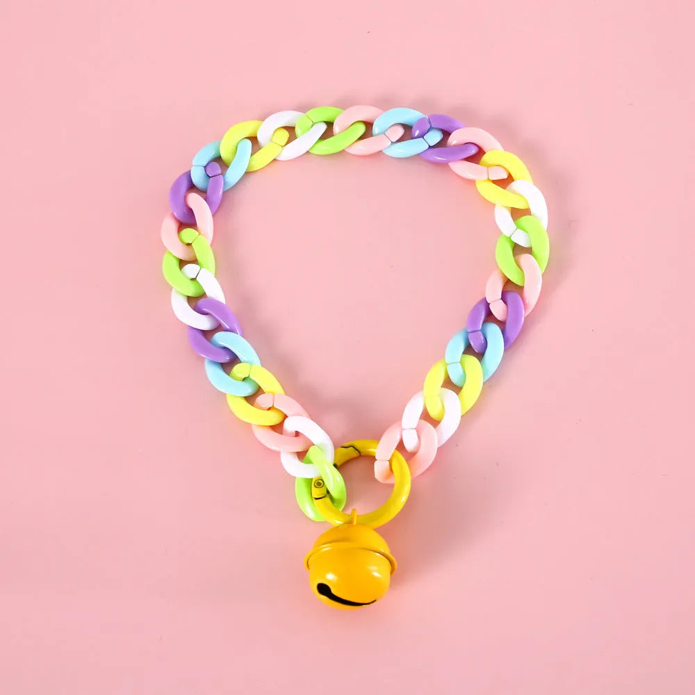 Adjustable plastic pet collar in candy chain blue colour on a white background, showing the monochrome pattern.