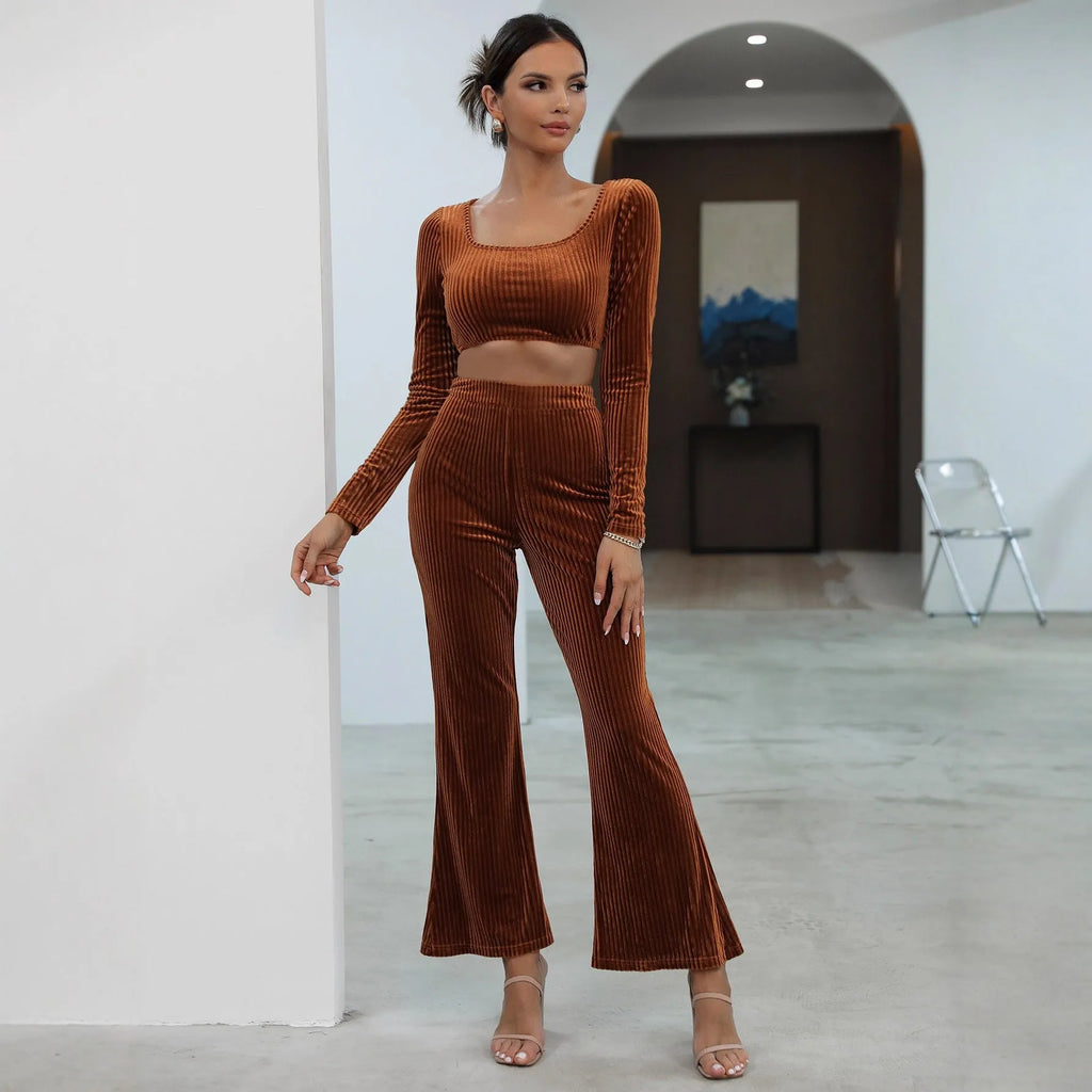 Caramel coloured long sleeve top and matching trousers laid flat, a casual two-piece sweater set.