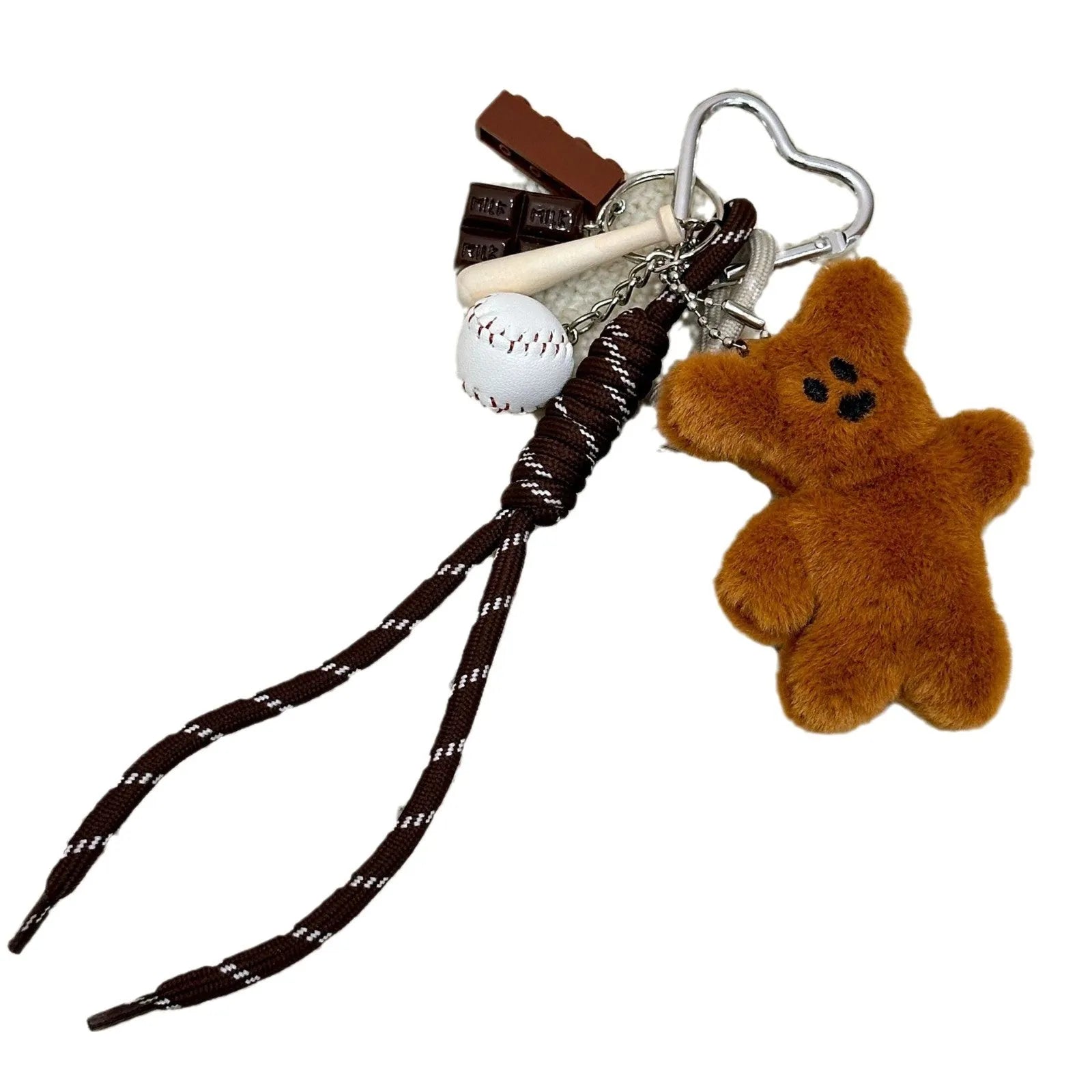 Brown plush bear pendant keychain attached to a bag, soft toy decoration