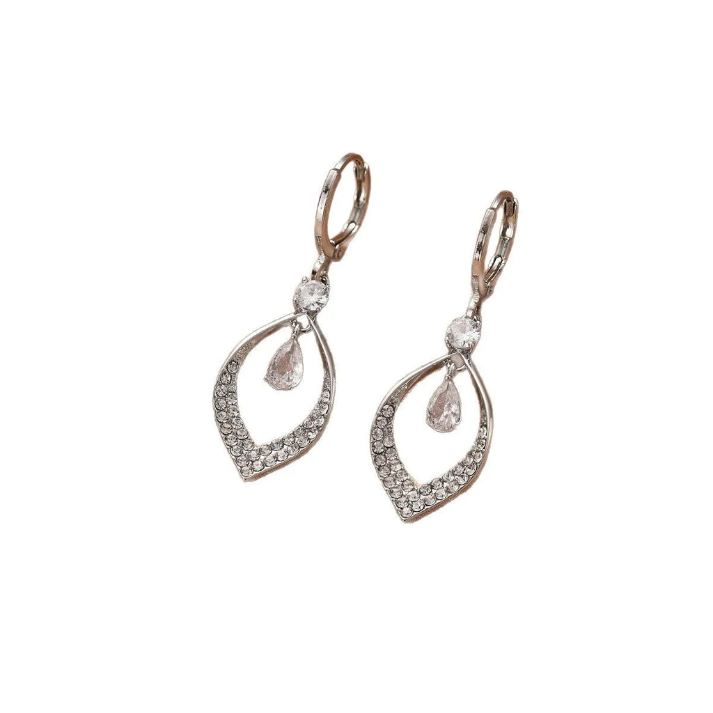 A pair of women's zircon water drop tassel earrings with gold-coloured buckles on a white background.