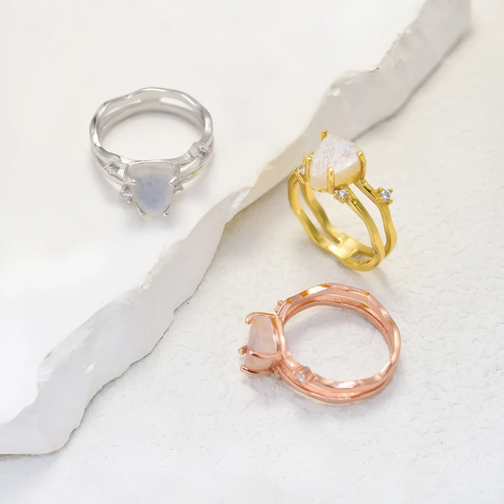 S925 sterling silver ring with an irregular triangle moonstone in a choice of gold-tone plating.