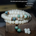 White jade bodhi root oblate bead bracelet with 108 flat round beads in 7x9mm and 8x10mm sizes.