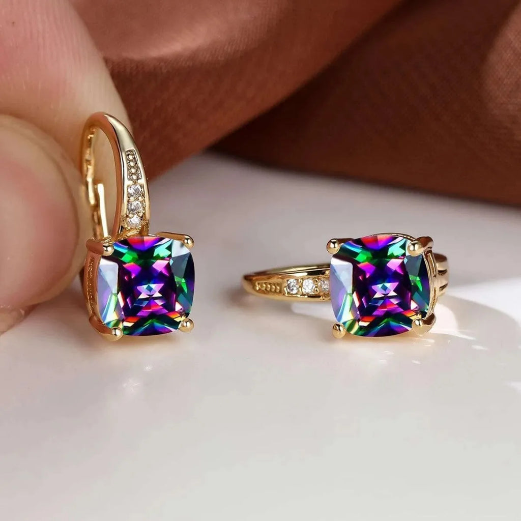 Square geometric gold ear clip with colourful moissanite stone inlay.