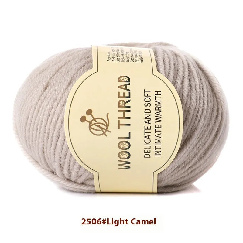 One roll of fine, twisted woolen hand-knitting yarn in a colour from the available palette, shown next to knitting needles.
