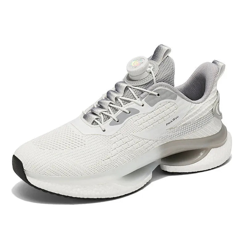 Low-top white running shoes with a rotating button buckle on a breathable mesh upper and a textured TPU sole.