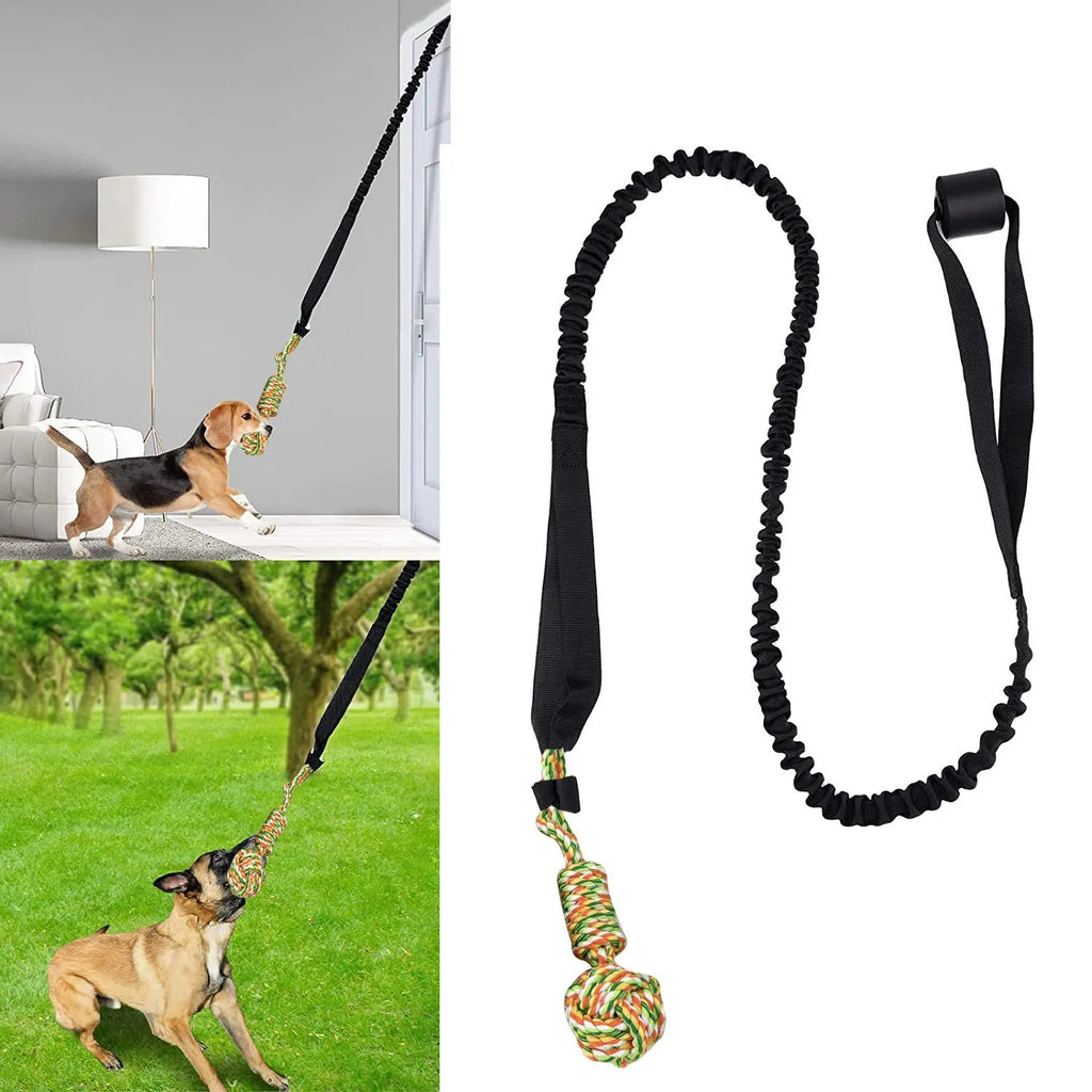 A woven cotton rope dog tug toy in either black, grey, or red, held ready for a game of tug-of-war.