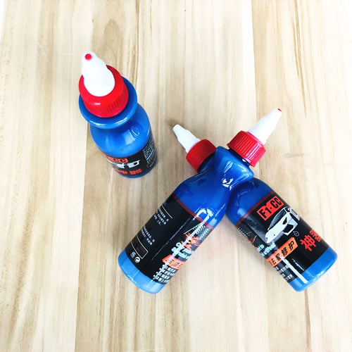 Small blue tube of car scratch repair gel for automotive paint touch-ups.