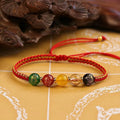 Five Gods of Wealth agate bracelet with hand-woven red rope braid and geometric beads