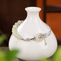 Women's 925 silver bracelet with Hetian jade lotus peace buckle in gold finish