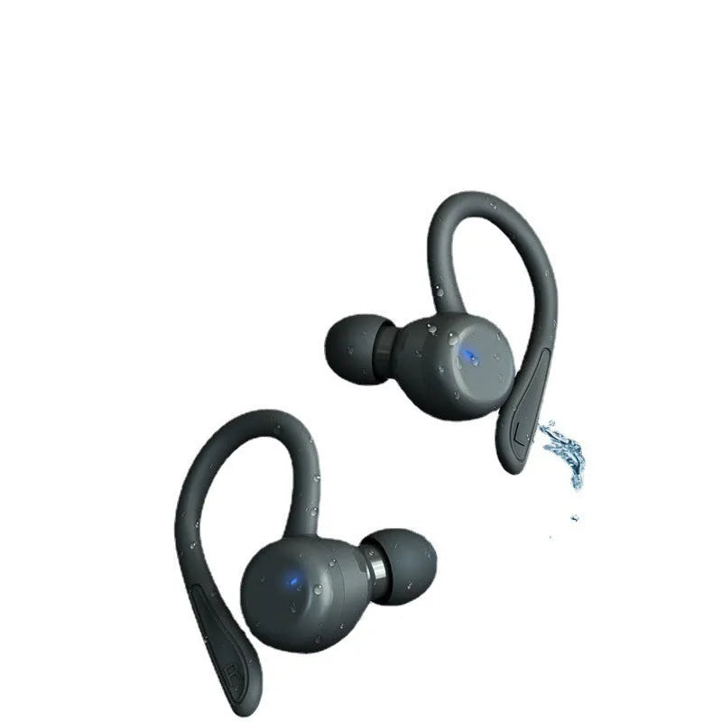 Black hanging ear wireless sports headphones with removable ear hooks on a blue background.