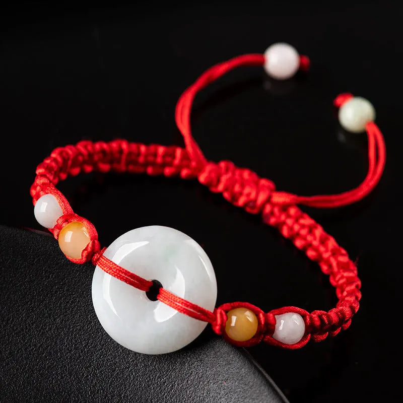 Round emerald-cut jade pendant on adjustable red rope bracelet with 14-20cm wrist fit