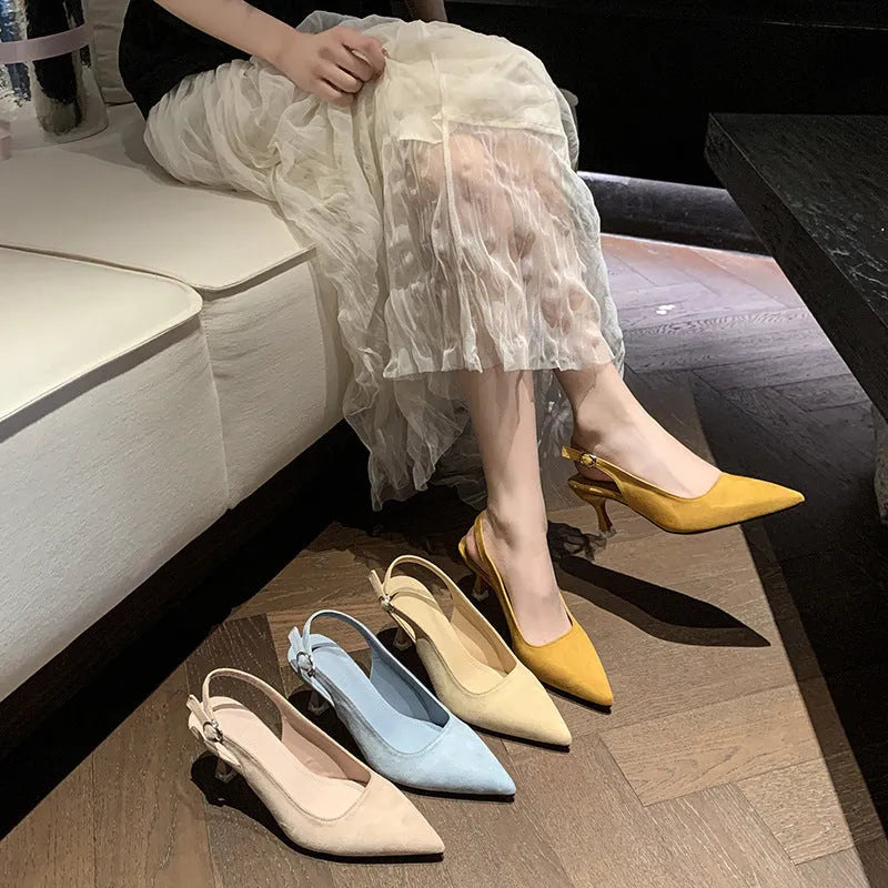 Women's suede pointed-toe stiletto high heels in apricot, pink, sky blue, and yellow colours on a rubber sole.
