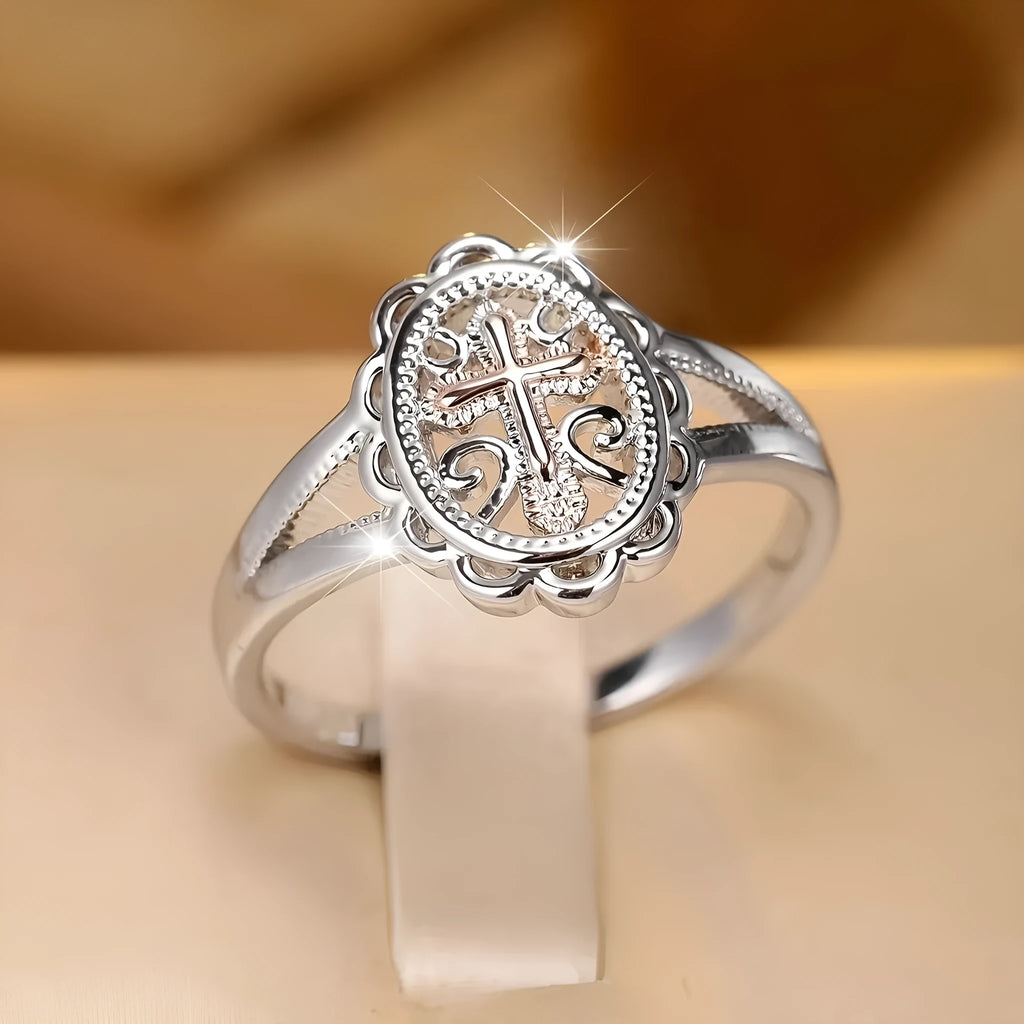 Women's silver cross lace fashion ring showing intricate pattern detail on alloy band