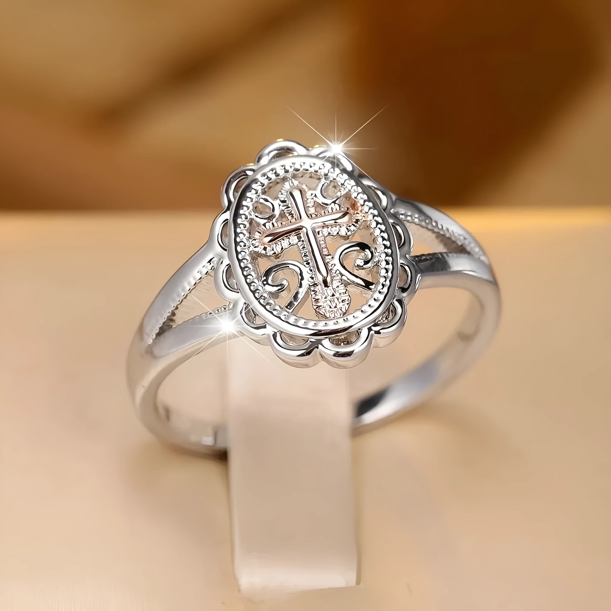 Women's silver cross lace fashion ring showing intricate pattern detail on alloy band