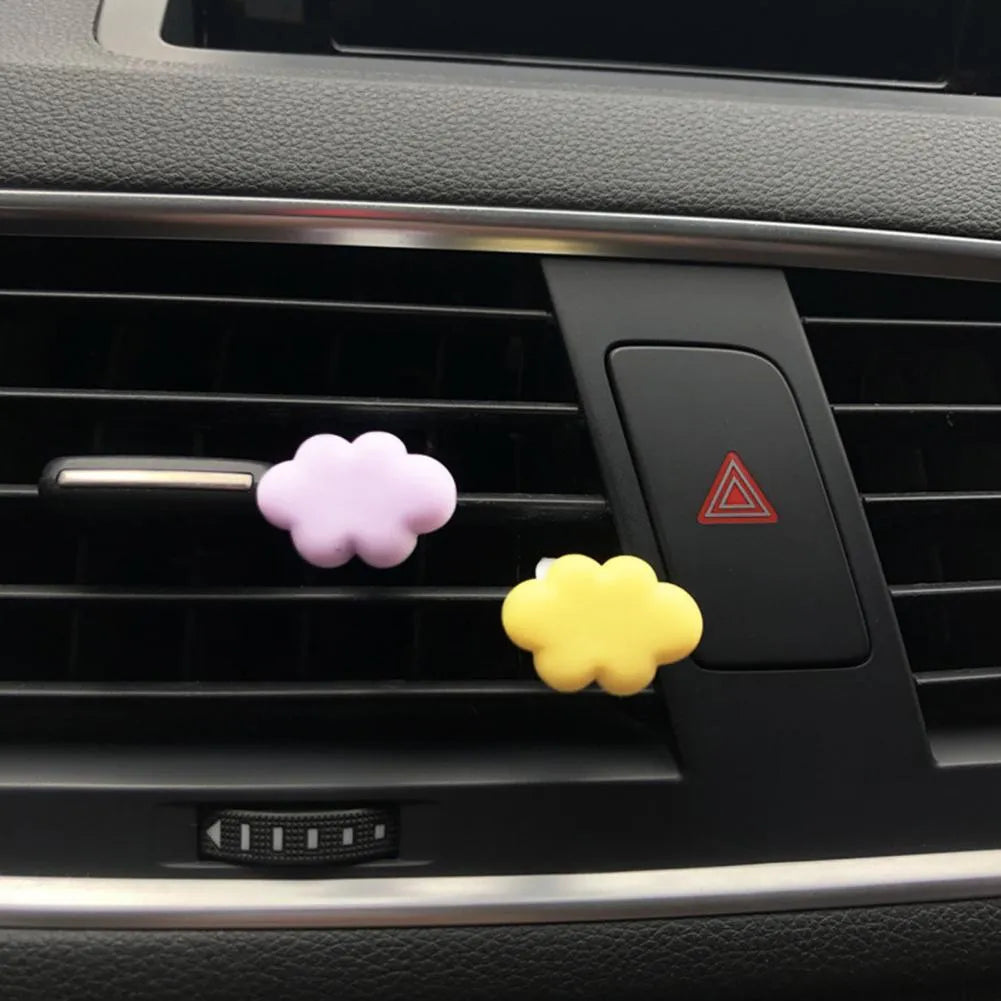 Cartoon Baiyun design resin car fragrance clip for air vents in assorted colours.