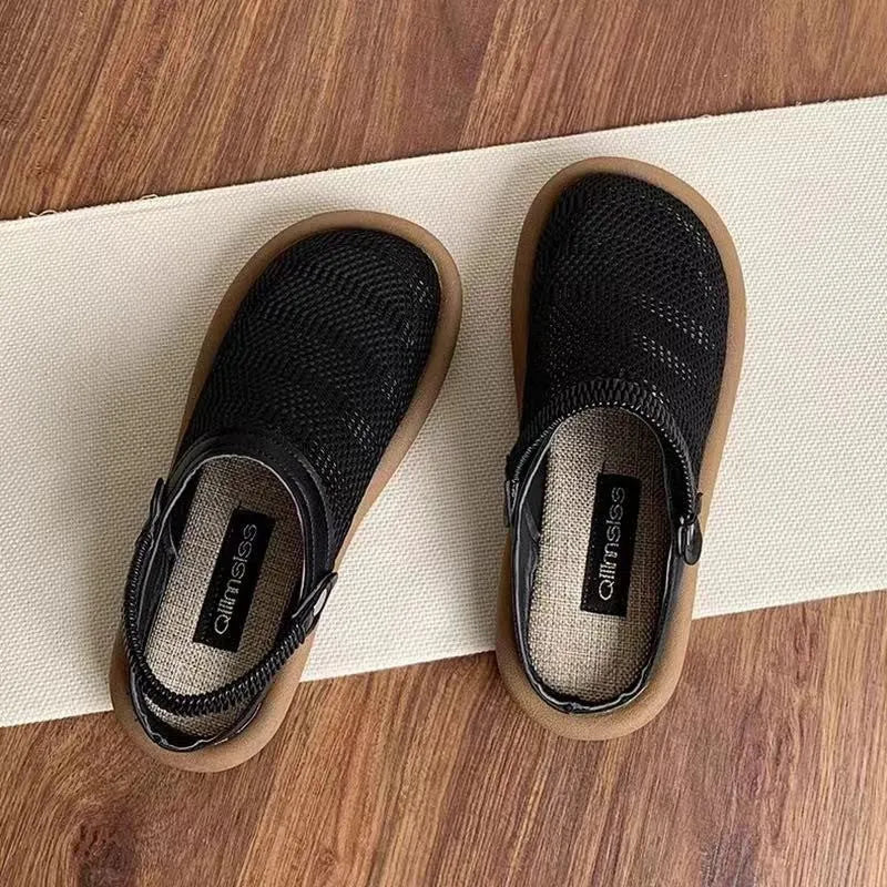 Breathable linen and mesh slip-on shoe with a soft rubber sole in milky white colour.