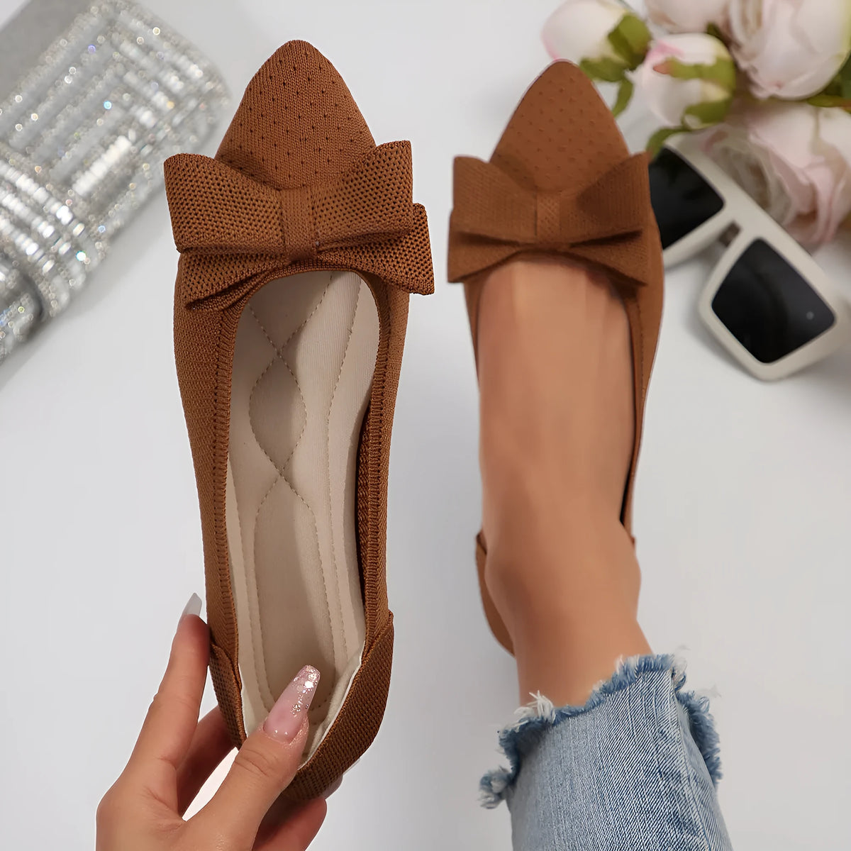Women's pointed knitted bow shallow mouth flat pumps in black with bow detail and rubber sole