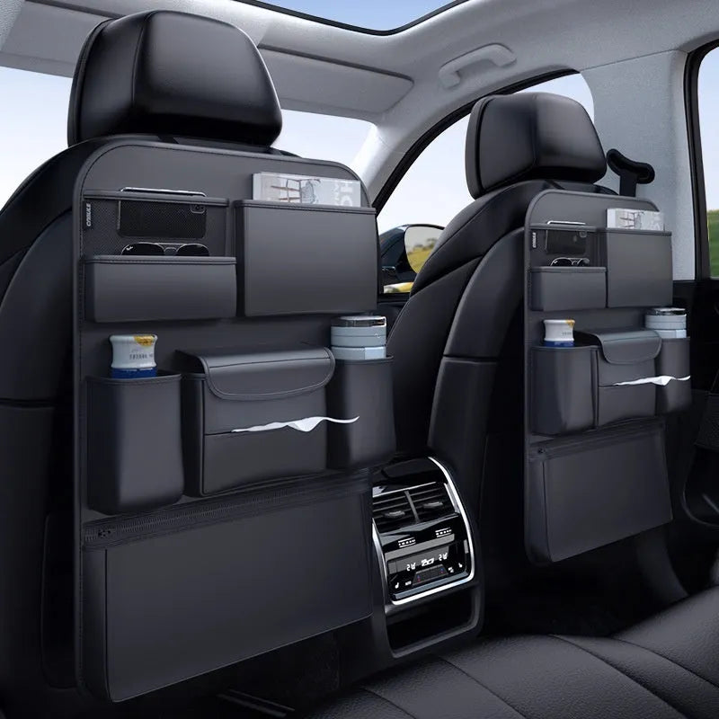 Black genuine leather car seat back hanging storage bag with a carry handle.
